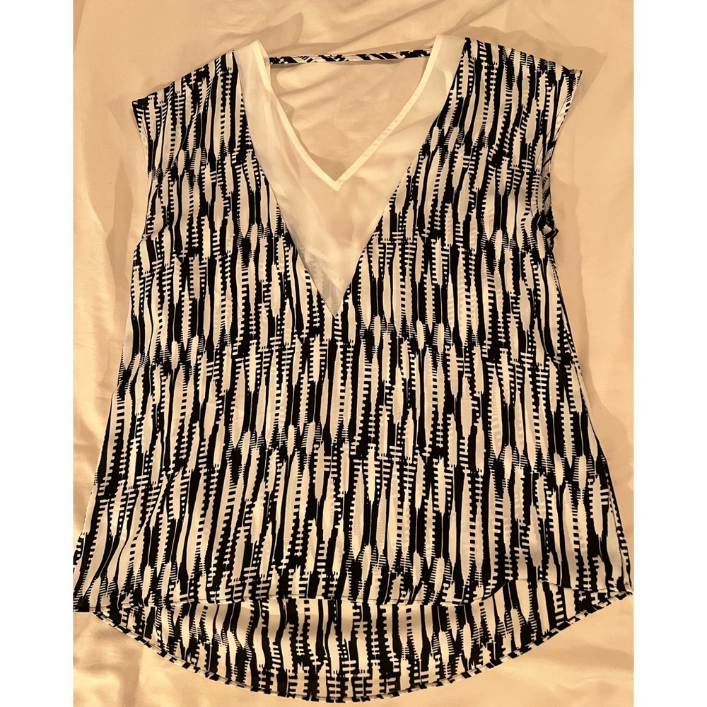 Size small top.  Size small.  Never worn.